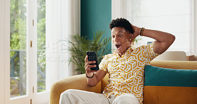 Buy stock photo Man, winner and shocked with phone for good news, college acceptance and success in home. Achievement, victory and opportunity with student in living room for university scholarship, results and wow