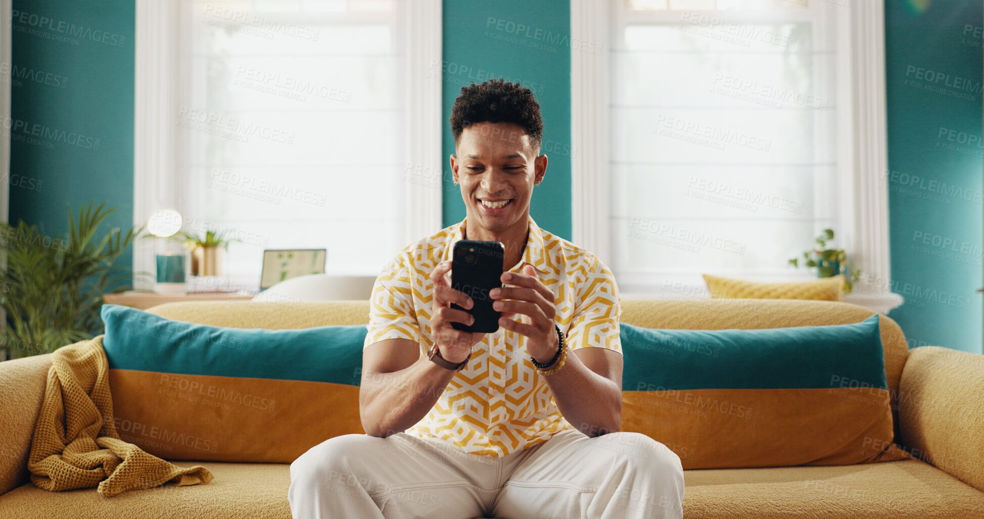 Buy stock photo Smile, student and check with phone at house for education results, college application and acceptance. Happy, man and mobile app for good news with university enrolment, scholarship and notification