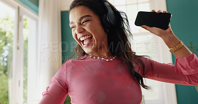 Buy stock photo Happy girl, dancing or headphones with music for audio streaming, entertainment or podcast at home. Excited, female person or carefree user with smile for sound listening, playlist or rhythm at house
