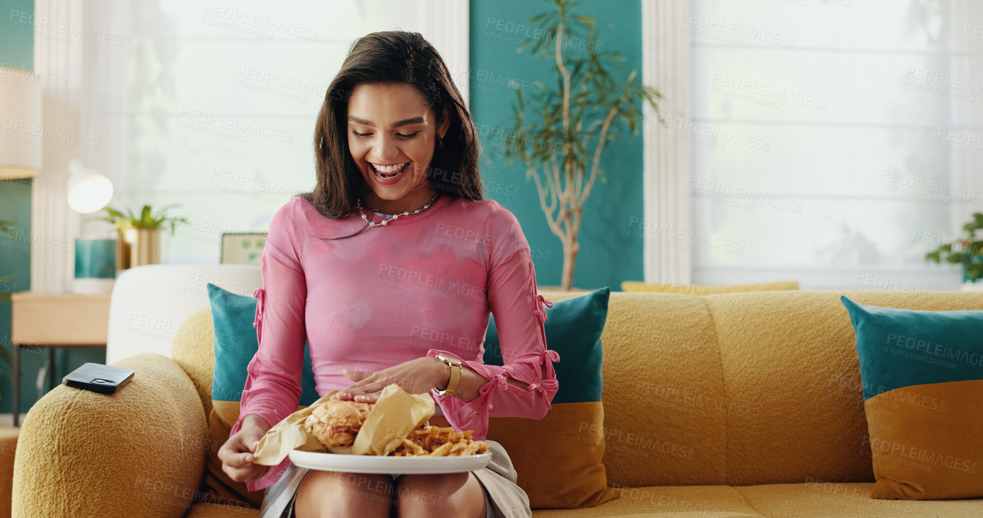Buy stock photo Home, burger and happy woman with fast food, fries and excited for takeaway to relax. Nutrition, hamburger and girl enjoy lunch order, beef sandwich and meat for unhealthy diet or snack addiction