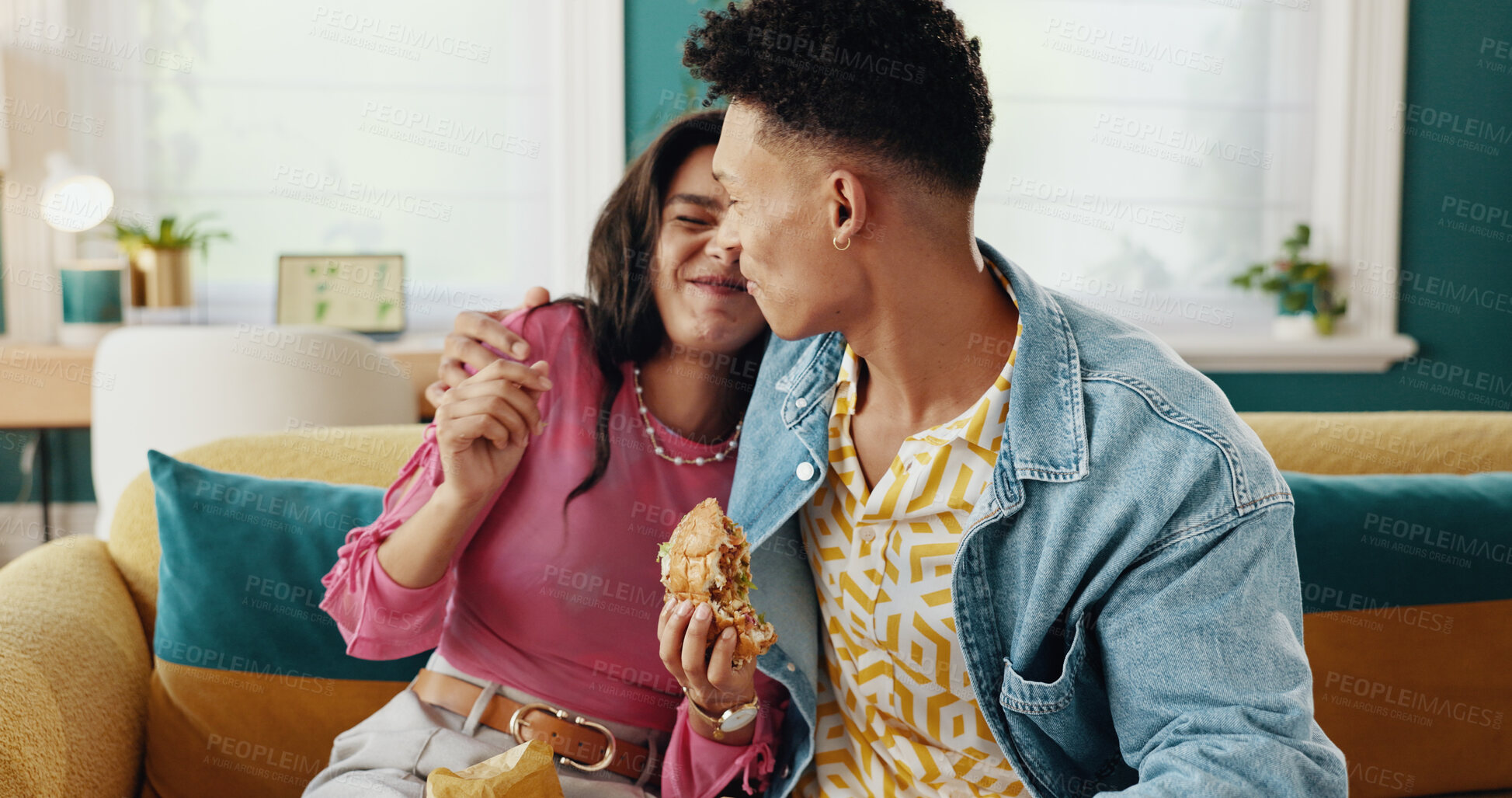 Buy stock photo Eating, couple and food for woman, hug and people with meal in living room, smile and love of takeaway. House, happy and man in relationship with lover, enjoying and embrace for date in lounge