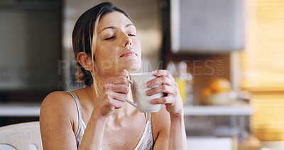 Buy stock photo Kitchen, woman and relax with aroma for coffee, espresso and warm cappuccino in morning at home. House, female person and chilling with smelling for tea cup, latte drink and comfortable on weekend