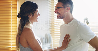 Buy stock photo Couple, happy and morning in kitchen, home and touch for care, love and conversation with memory. Mature man, woman and connection with bonding, smile and laughing with funny joke at apartment