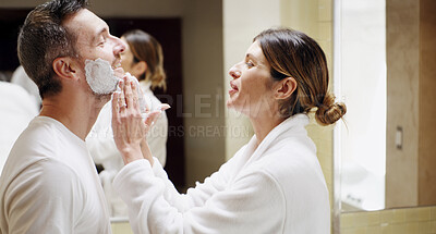 Buy stock photo Shaving, skincare and couple in bathroom with beauty, help and facial treatment for hair removal. Support, care and woman with man in home with foam, marriage and grooming routine for hygiene