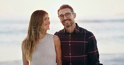 Buy stock photo Couple, happy and love at ocean outdoor of anniversary, summer vacation and bonding together. Smile, people and lens flare with getaway trip, romantic date and marriage commitment for tropical travel