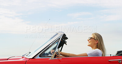 Buy stock photo Excited, road trip and smile of woman in convertible for adventure, break or travel on blue sky. Holiday, summer and vacation with happy driver outdoor in sports car for journey, ride or transport