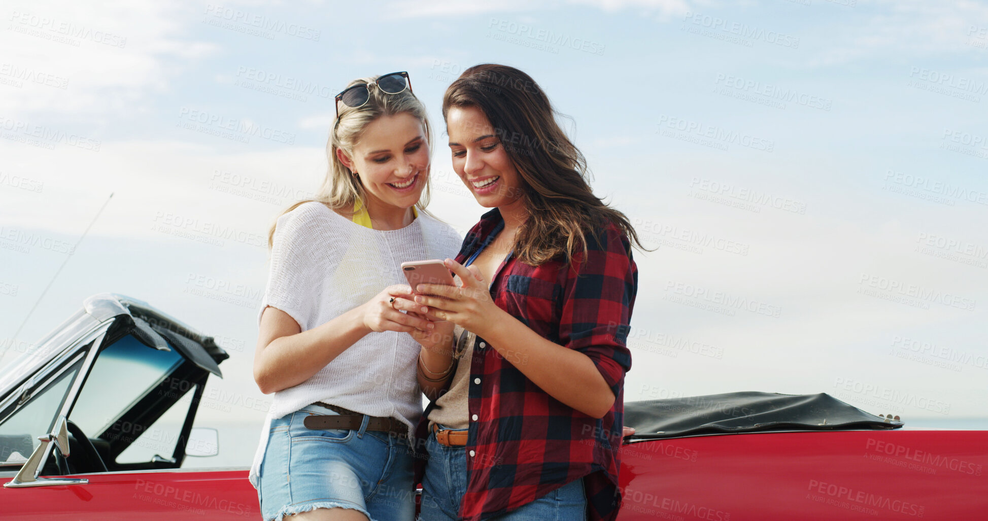Buy stock photo Phone, women or friends on road trip with car for vacation, holiday or post adventure on social media profile. Mobile, convertible or happy girls on journey, travel or navigation with map app outdoor