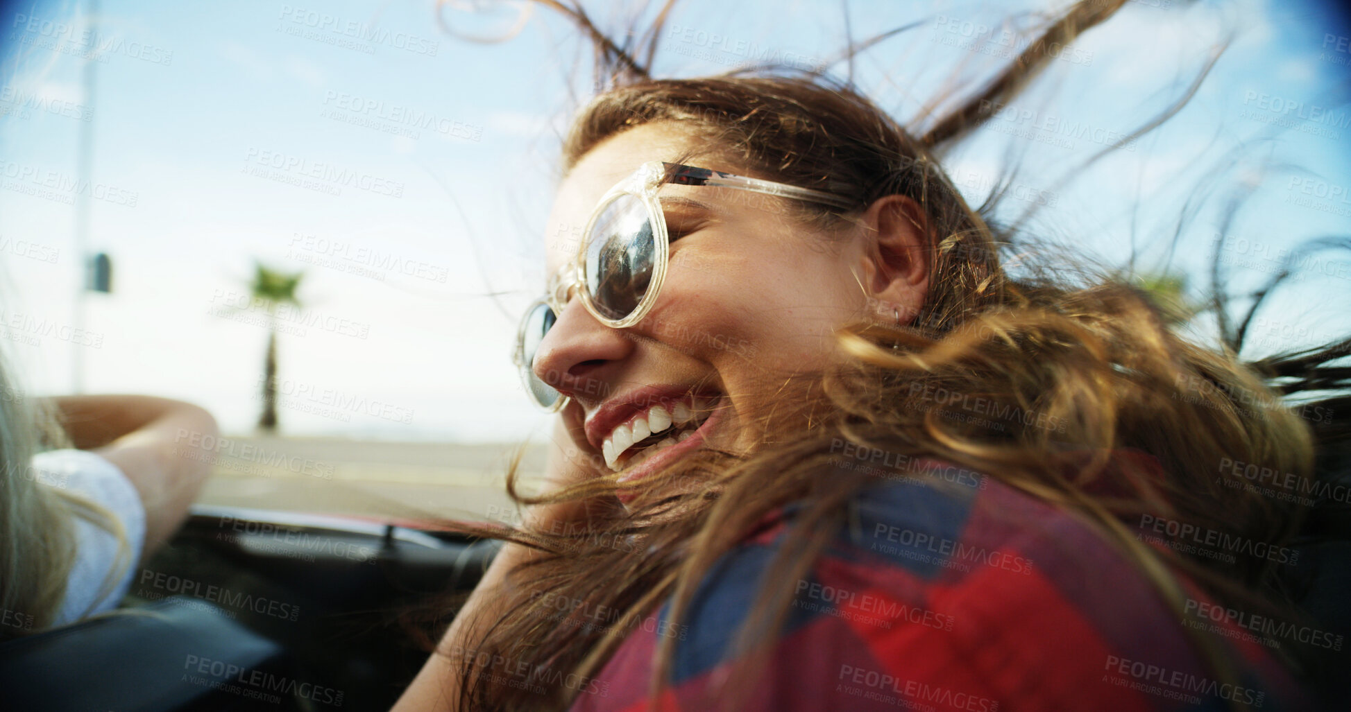 Buy stock photo Woman, laughing and sunglasses in convertible for road trip adventure, travel break and breeze outdoor. Happy, female person and sports car with scenery drive, transport journey and summer vacation