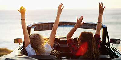 Buy stock photo Back, freedom and road trip with woman friends in convertible for adventure, break or travel. Beach, holiday and vacation with happy people outdoor in sports car for drive or transport together