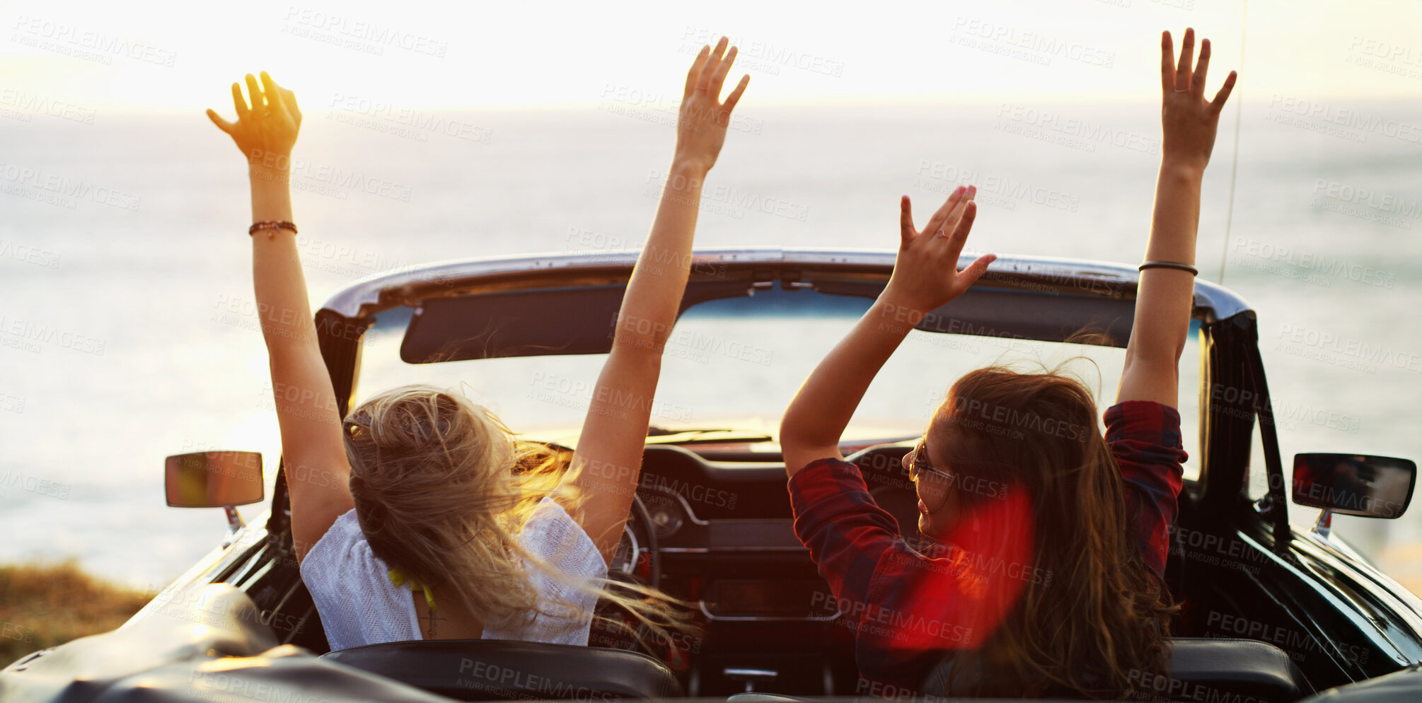 Buy stock photo Back, freedom and road trip with woman friends in convertible for adventure, break or travel. Beach, holiday and vacation with happy people outdoor in sports car for drive or transport together