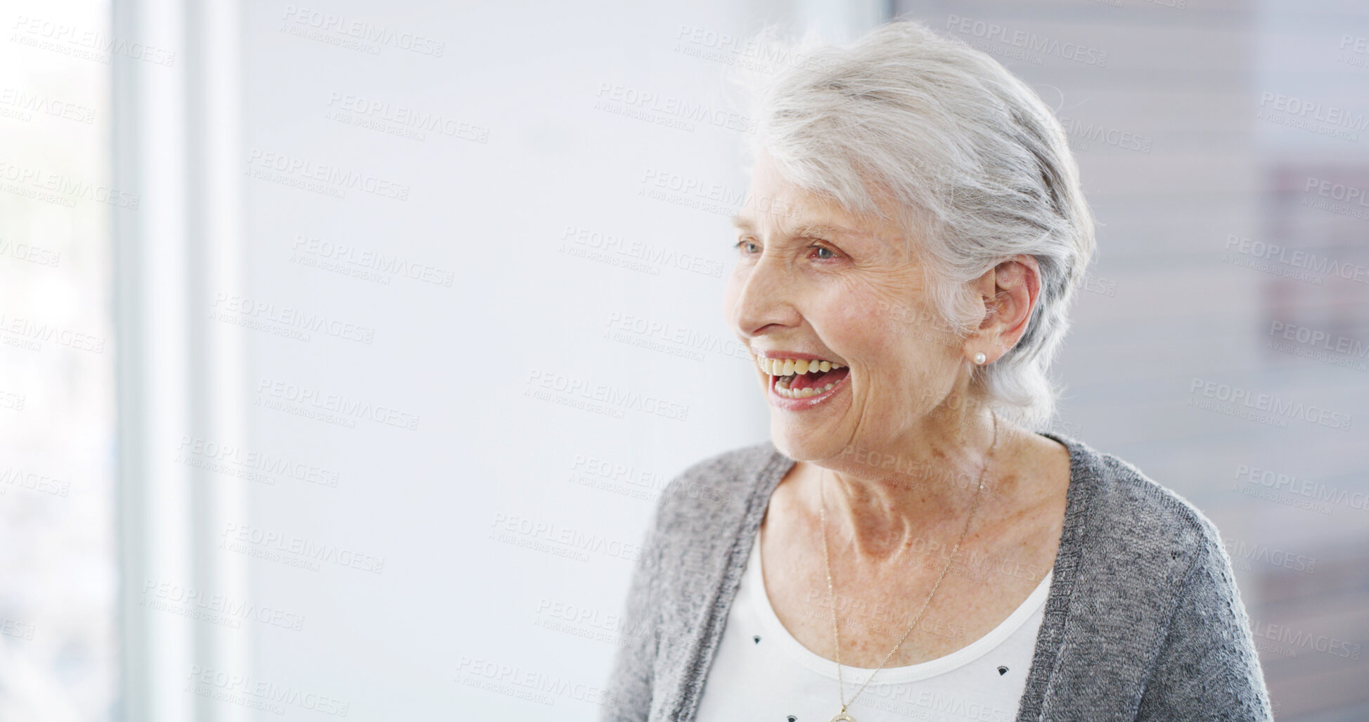 Buy stock photo Smile, laughing and relax with old woman in house for retirement, funny joke and pension. Happiness, senior care and comic with elderly person in nursing home for wellness, calm grandmother and humor