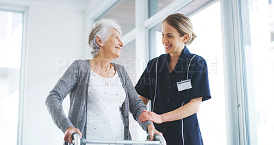 Buy stock photo Physical therapy, support and woman with walker, healthcare or balance for rehabilitation in clinic. Smile, physiotherapist and help for senior person with disability, happy and kindness in hospital