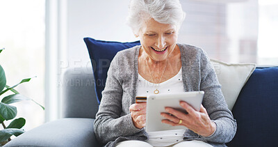 Buy stock photo Senior, woman and tablet with credit card on sofa for online shopping, internet banking or product sale in home. Finance, old person and digital app for debit transaction and retirement plan payment