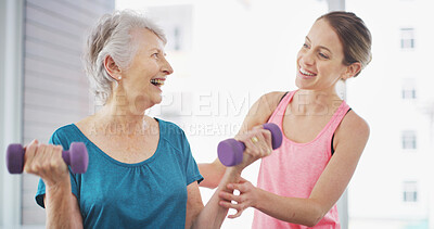 Buy stock photo Senior woman, physiotherapist and dumbbells in gym for fitness, instruction and rehabilitation. Elderly client, physiotherapy or weights in practice with support, joint care and pleased with progress