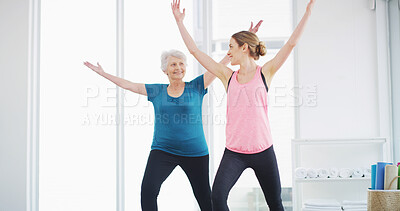 Buy stock photo Yoga, senior woman and trainer for fitness, healthy body and smile for geriatric wellness. Stretching, pilates coach and exercise together for balance, holistic and help with physical therapy in gym