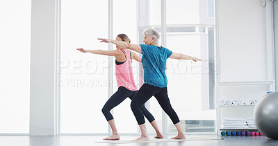 Buy stock photo Yoga, senior woman and coach for fitness, healthy body and warrior pose for geriatric wellness. Stretching, pilates trainer and exercise together for balance, physical therapy and holistic in gym