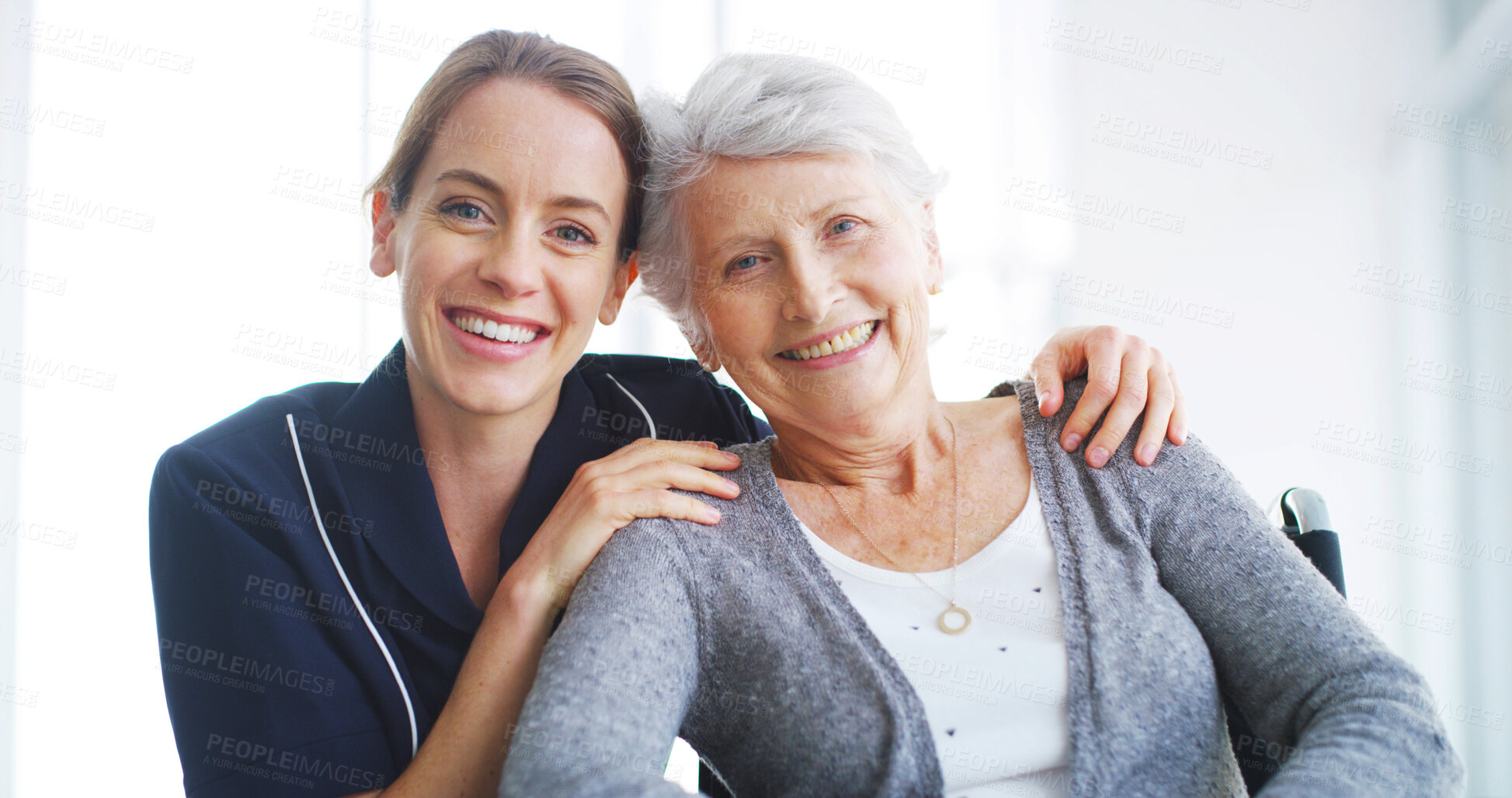 Buy stock photo Portrait, caregiver and kindness for woman with disability, smile or hug as emotional support in clinic. Healthcare, patient and senior person with wheelchair in nursing home, nurse or rehabilitation