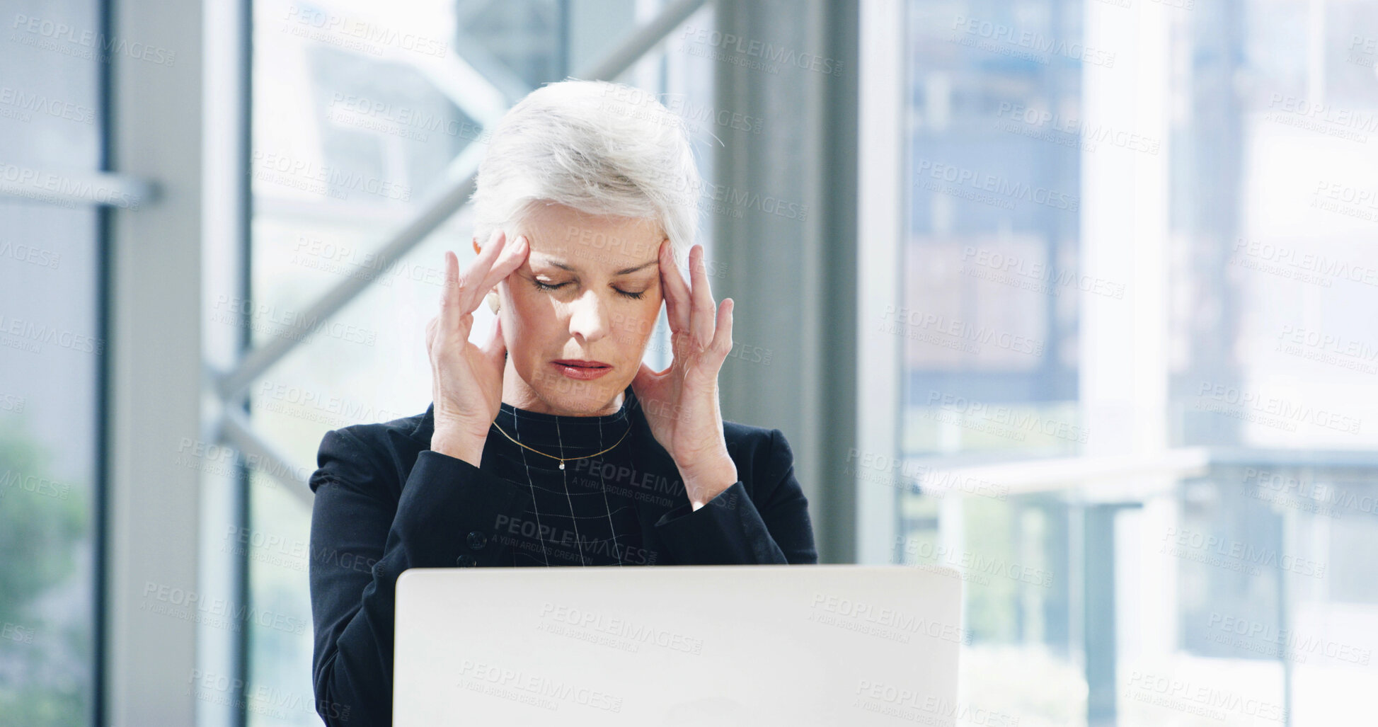 Buy stock photo Business, computer and mature woman with headache in modern office, burnout and overworked. Pain, employee and accountant in workplace, laptop and migraine with anxiety, difficult audit and brain fog