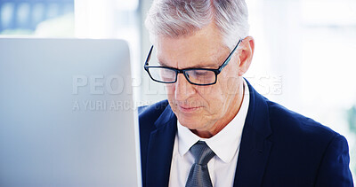 Buy stock photo Computer, thinking and mature businessman in office for legal case, proposal and project or online research. Corporate attorney, lawyer and worker for consultant report, typing email and planning