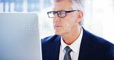 Buy stock photo Computer, thinking and businessman in office for legal case, proposal and project or online research. Corporate attorney, mature lawyer and worker for consultant report, typing email and planning