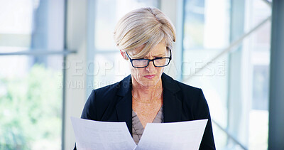 Buy stock photo Documents, business woman and compare in office for legal case, proposal and project or research. Corporate attorney, mature lawyer and worker for consultant report, reading paper and planning