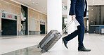 Businessman, legs and walking with suitcase in airport for travel, work flight or new opportunity. Man, traveler or immigrant with luggage or papers for business trip, commute or corporate relocation