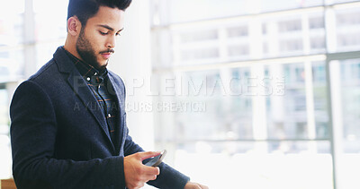 Buy stock photo Reading email, phone and business man in office with online texting, message and networking. Professional, corporate and worker on smartphone for social media, communication and contact in lobby