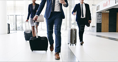 Buy stock photo Business people, legs and luggage on travel for international conference with team in lobby. Person, group and lawyer with baggage, suitcase and trip at global convention for corporate law in hallway