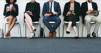 Buy stock photo Business people, legs or waiting room with line at office for job opportunity, meeting or career search. Group, row or employees on technology for online application, experience or onboarding process
