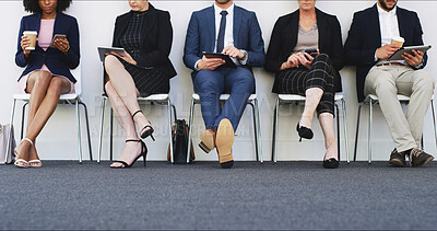 Buy stock photo Business people, legs or waiting room with row at office for job opportunity, meeting or career search. Group, line or employees on technology for online application, experience or onboarding process