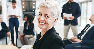Buy stock photo Smile, meeting and portrait of mature businesswoman in office for negotiation on real estate law case with clients. Confident, professional and attorney with team for legal property transaction deal.