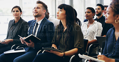 Buy stock photo Notes, group and business people at seminar with attention for corporate training, development or teamwork. Audience, men and women at conference for presentation, planning and opportunity for growth