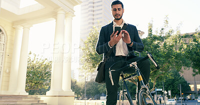 Buy stock photo Businessman, bicycle and travel with phone for communication, online texting or navigation in city. Man, tourist or traveler with bike or mobile smartphone for chatting, app location or local commute