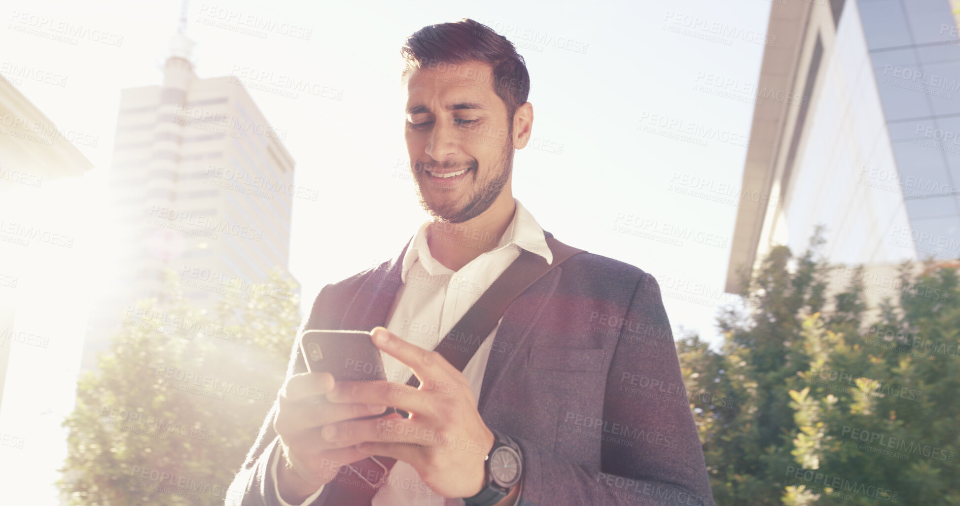 Buy stock photo Happy, businessman and typing with phone in city for social media, online communication or network connectivity. Man, tourist or traveler with smile on mobile smartphone for business app or research