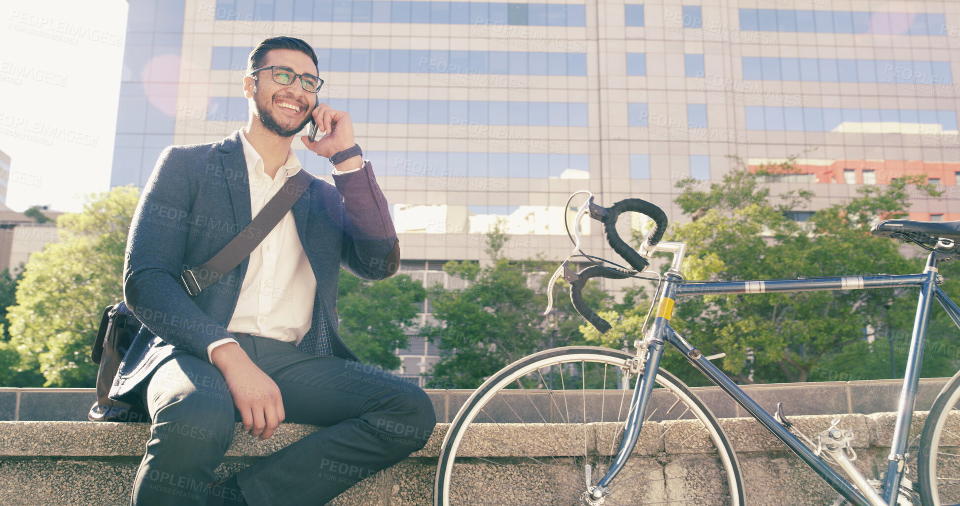 Buy stock photo City, bicycle and phone call with business man outdoor for communication or travel to work. Break, carbon neutral and conversation with happy employee person in urban town for low angle or update