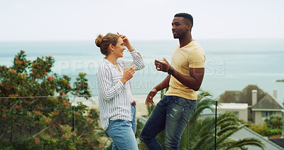 Buy stock photo Travel, ocean and couple with drinks on hotel terrace for tropical vacation with chat, relax and bonding together. Cocktail, man and woman at beach resort with date, smile and love on island holiday