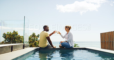 Buy stock photo Travel, hotel and couple cheers at pool for tropical vacation with drinks, relax and happy bonding together. Cocktail, man and woman at beach resort with toast, smile and love on island holiday