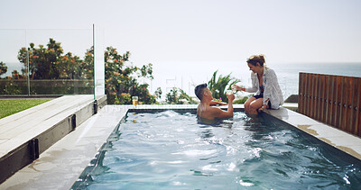 Buy stock photo Travel, hotel and couple cheers at swimming pool for tropical vacation with fun, relax and bonding together. Drinks, man and woman at beach resort with toast, smile and love on valentines day holiday