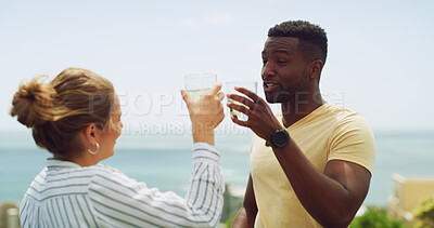 Buy stock photo Relax, ocean and couple cheers on hotel terrace for tropical vacation with drinks, travel and bonding together. Cocktail, man and woman at beach resort with toast, smile and love on island holiday