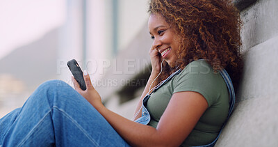 Buy stock photo Happy woman, relax and earphones with phone in city for video call, music or communication. Female person, tourist or user with smile on mobile smartphone for online connectivity or network in town