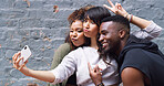 Selfie, happy and group of friends by wall in city for memory, social media or profile picture on holiday. Funny, goofy and young people with photography picture for content creation vlog in town.