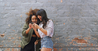 Buy stock photo Wall, women and friends with smartphone, showing or excited for acceptance to college or notification. Joy, wow and student with results for application, success and email for registration to school
