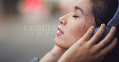 Buy stock photo Headphones, calm and woman in city with music for anxiety release in morning on travel journey. Peace, audio tech and female student listening to online zen playlist, podcast or radio in urban town.