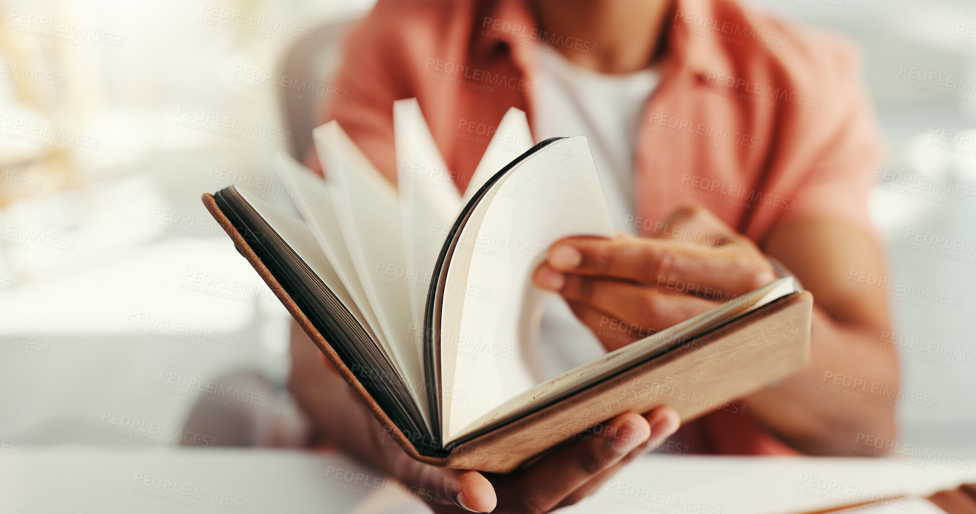 Buy stock photo Book, hands and pages with business person at desk in office for calendar, reminder or schedule. Diary, journal or notes with design employee in creative workplace for development or planning