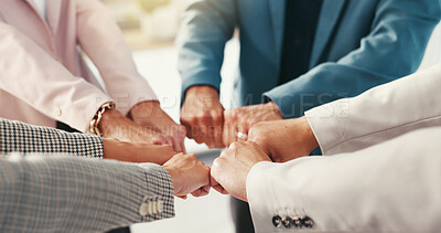 Buy stock photo Fist, huddle and team building with business people in office together for solidarity or unity. Collaboration, hands and power with employee group in workplace for growth, motivation or strength
