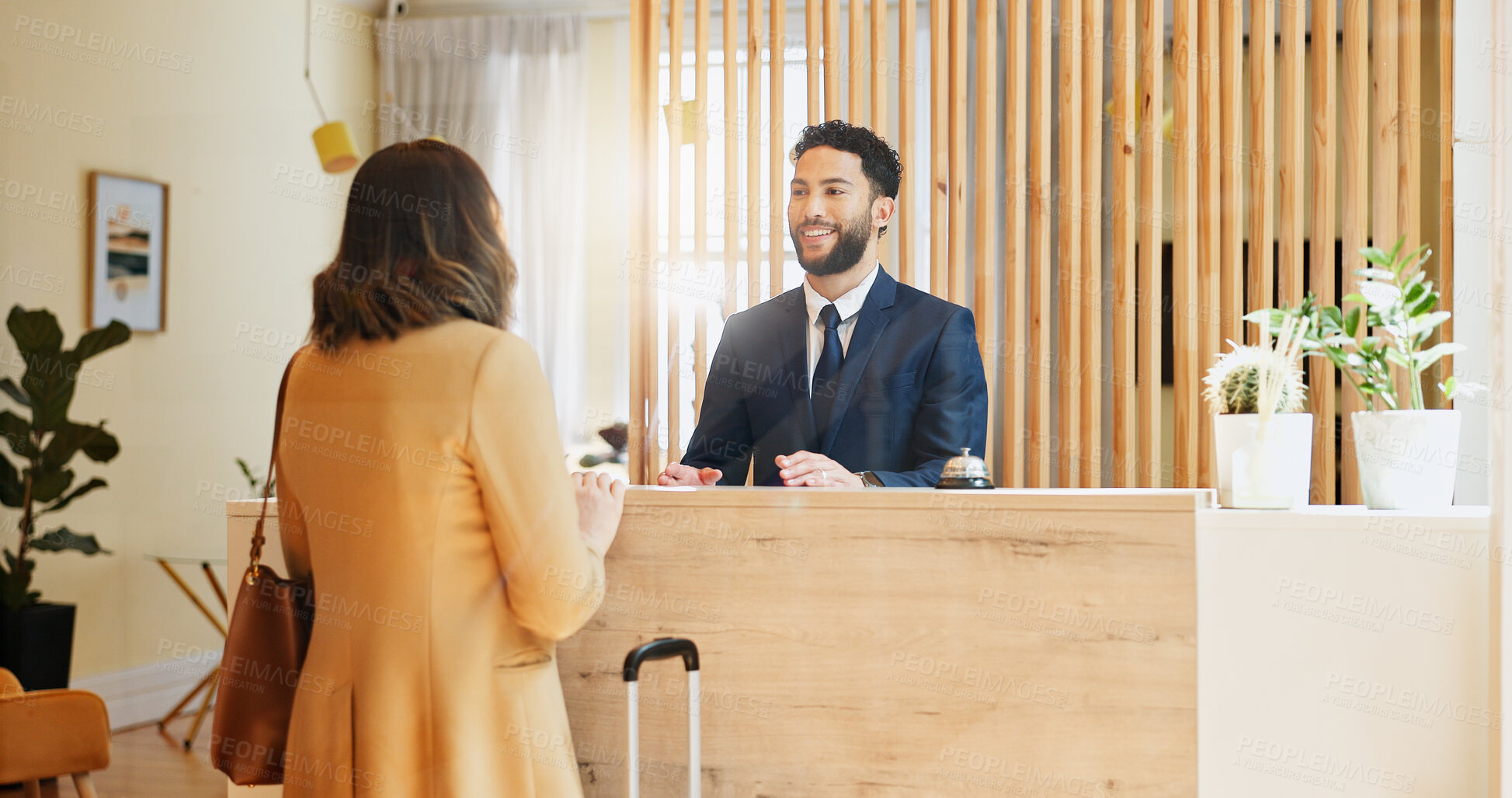 Buy stock photo Hotel, check in and woman at desk with man, smile and friendly reception service for hospitality. Welcome, registration and receptionist with client at counter for accommodation, booking and travel