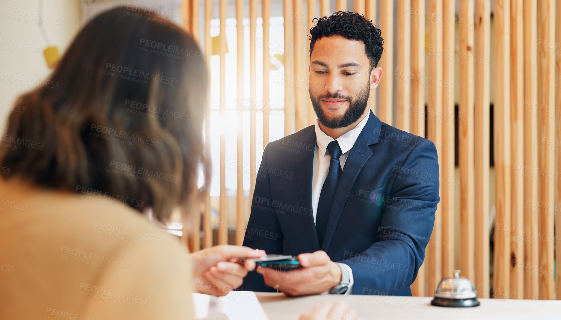 Buy stock photo Hotel, credit card and woman at desk with man, pos and friendly reception service for hospitality. Payment, registration and receptionist with client at counter for accommodation, booking and travel