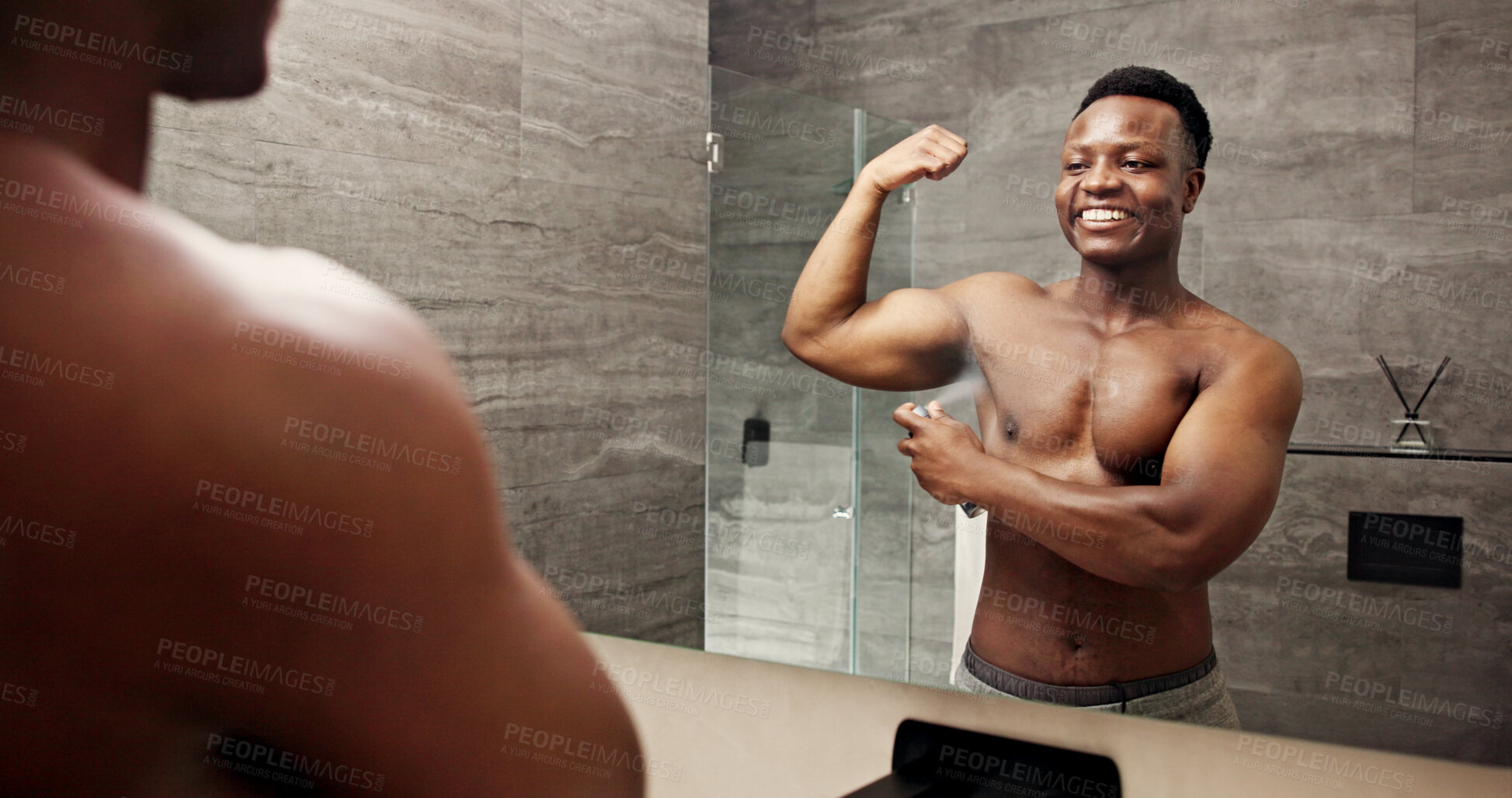 Buy stock photo Happy, black man and spray deodorant in bathroom for hygiene, clean scent and underarm treatment. Person, mirror reflection and perfume for smelling fresh, grooming routine and sweat control at house