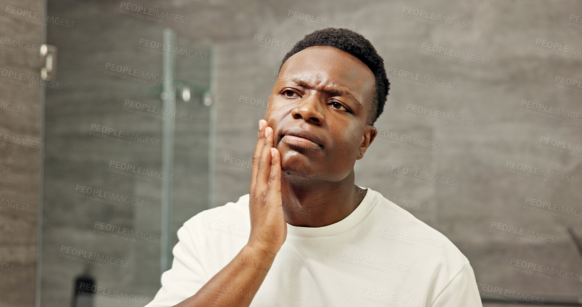 Buy stock photo Black man, mirror and thinking on skin in home, bathroom and reflection on dermatology results. Male person, contemplating skincare treatment and texture with problem, cosmetic stress and frustrated