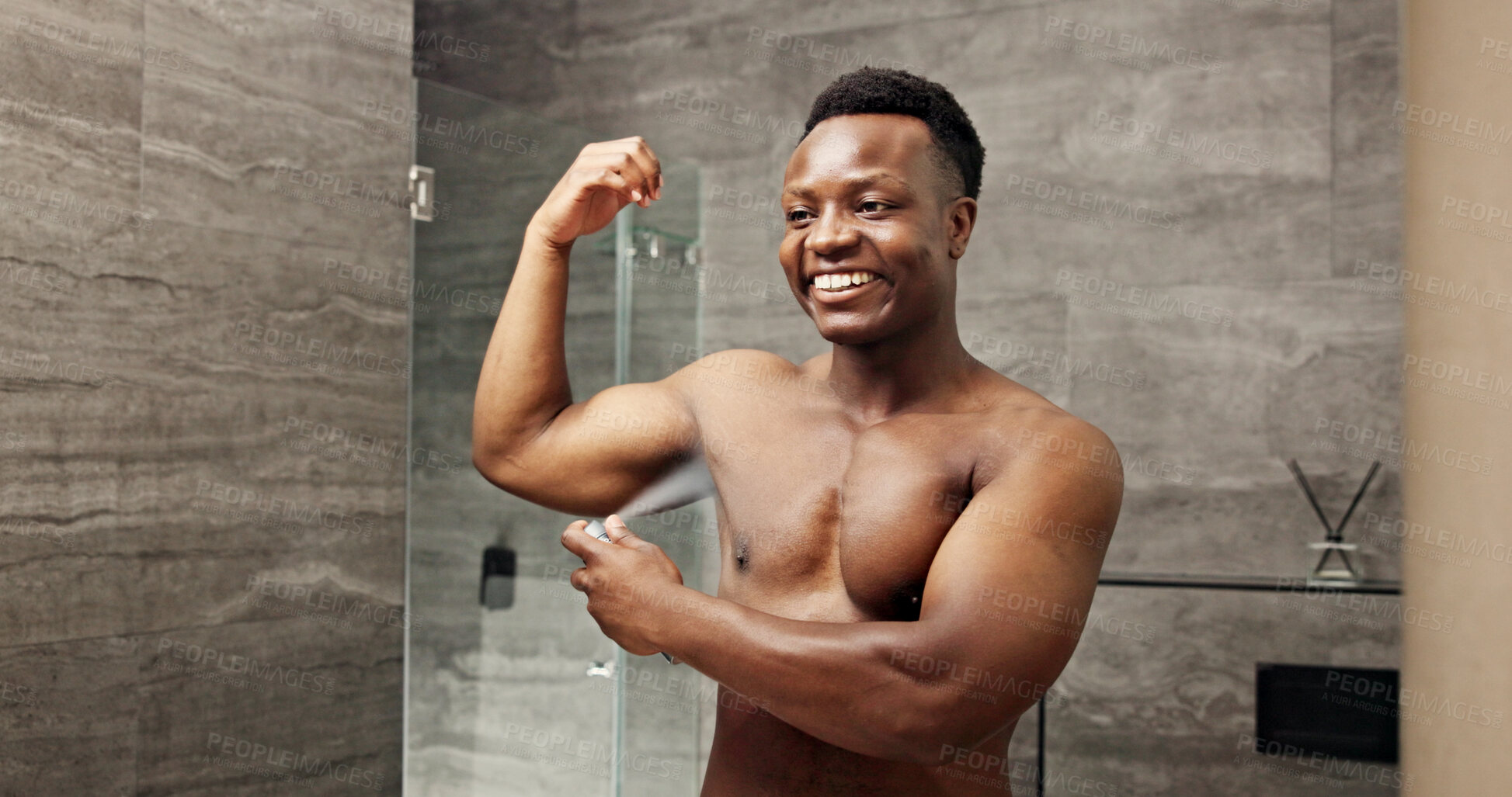 Buy stock photo Black man, smile and spray deodorant in bathroom for hygiene, clean scent and underarm treatment. Person, mirror reflection and perfume for smelling fresh, grooming routine and sweat control at house
